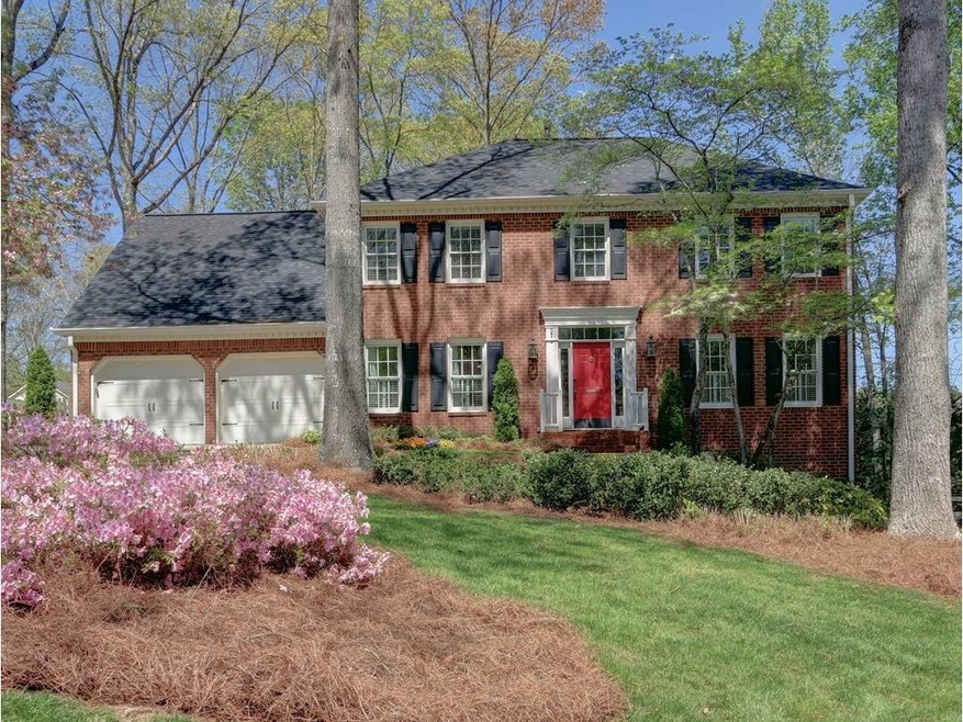 Beautiful 3 sided brick home.