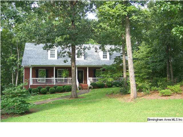 Home is located on a large wooded lot