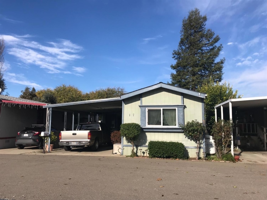 Lovely single wide with carport