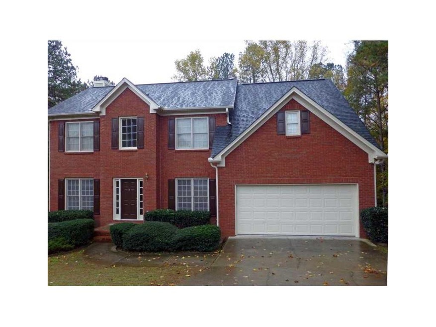 Exterior Front. Brick front home nestled on cul-de