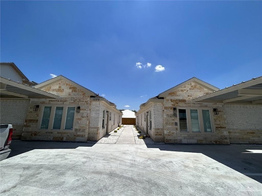 View of side of home with stone siding