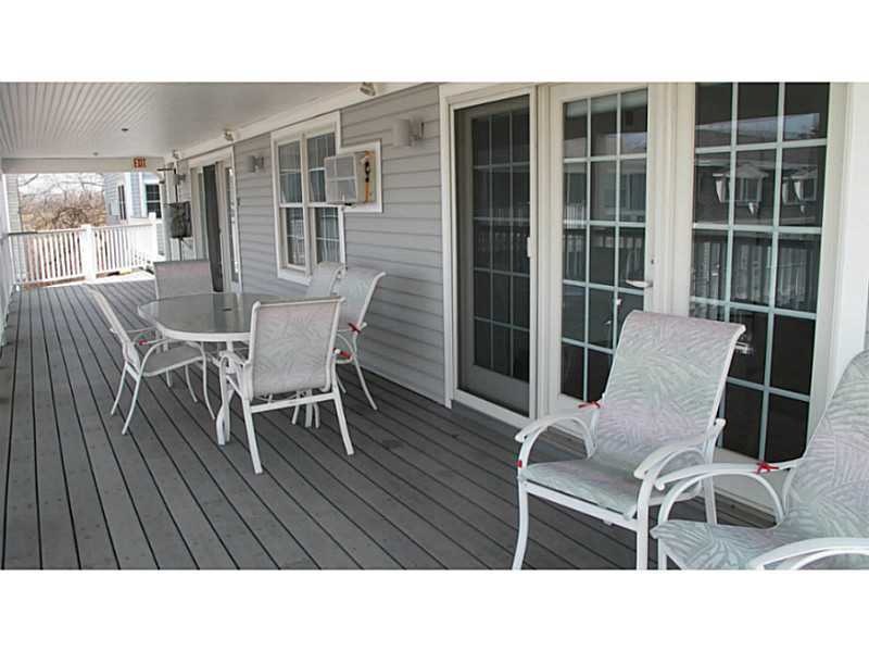 Exterior Front. Large deck, entry way