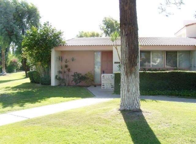 SIDEWALK TO FRONT DOOR ALSO LEADS TO CARPORT.  OPE