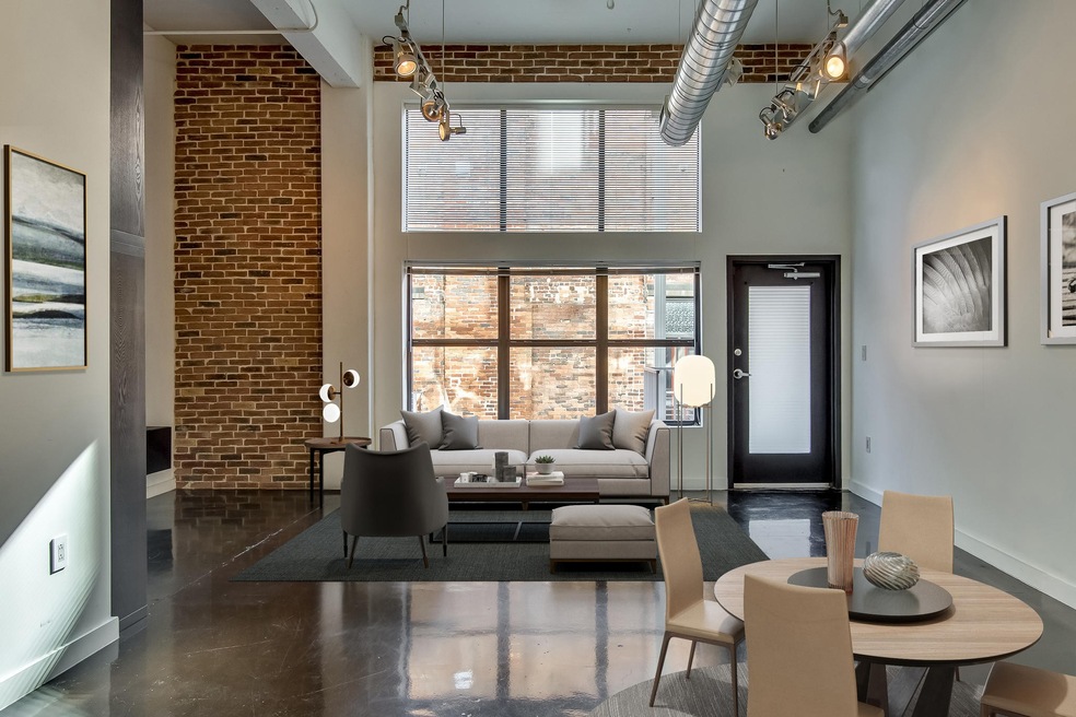 Welcome to #404 in the Kress! This virtually staged photo shows just how much space you have in this loft condo.