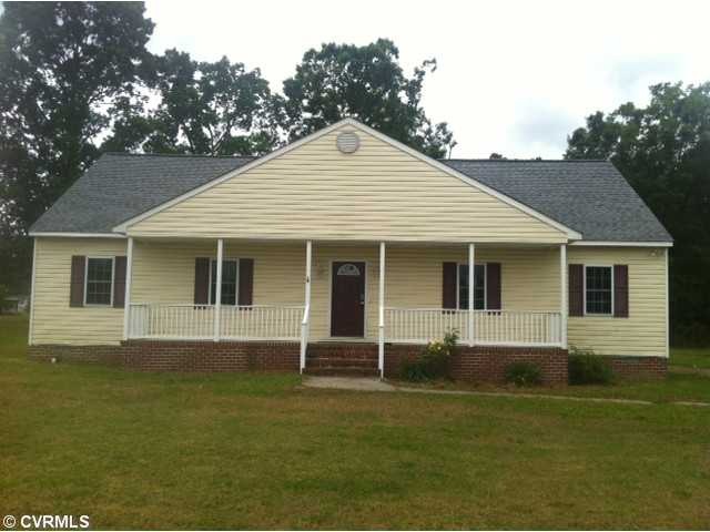 Exterior Front - This home sits on 4 acres.