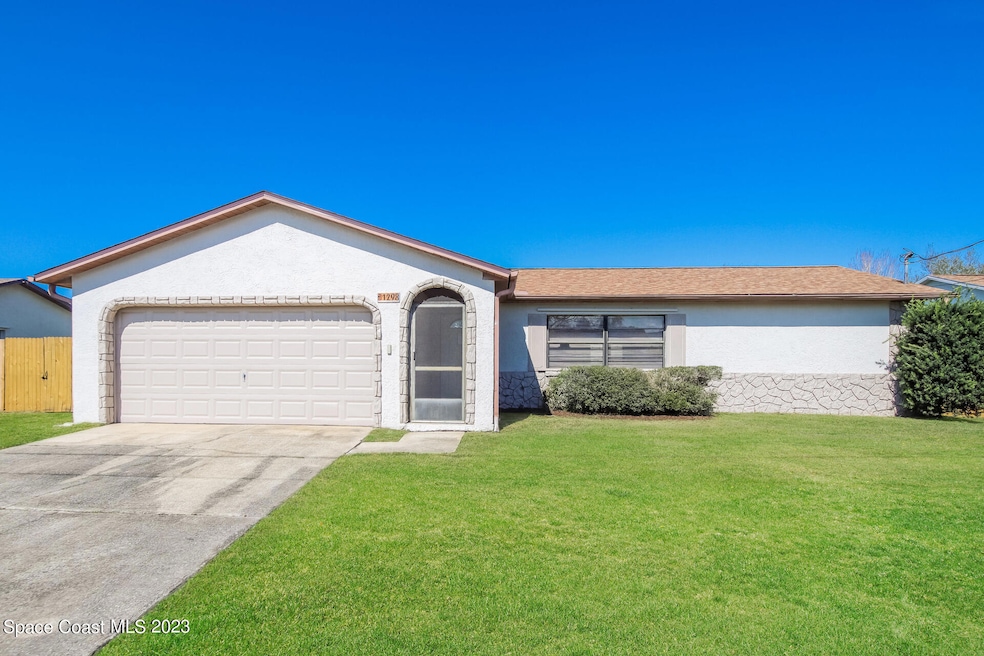 1298 Robbinswood Dr, Rockledge, FL 32955 - photo 1