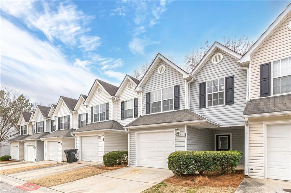 Townhome / multi-family property with a garage