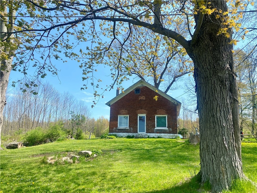 This red brick schoolhouse charmer is on the corner of Franklin Pike and Byham.  This is the Franklin Pike view.