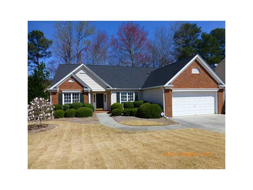 Exterior Front. Well maintained front yard.
