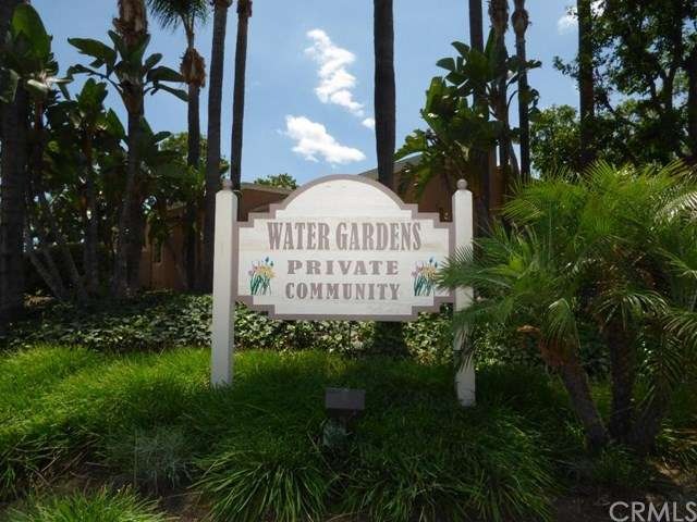 Water Gardens Community w/ lush green plants and t