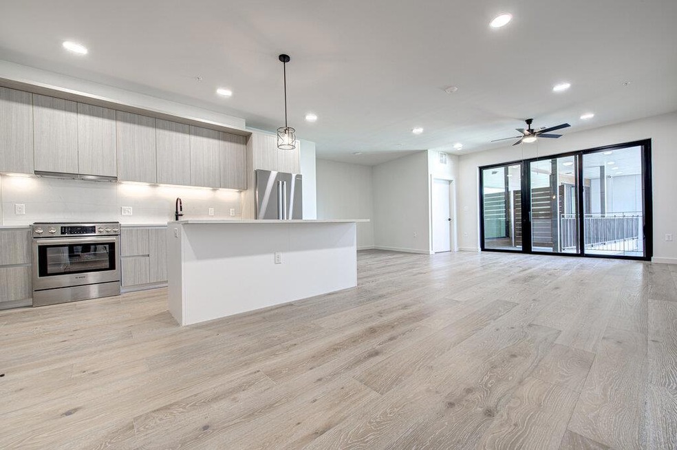 Kitchen featuring stainless steel appliances, mod