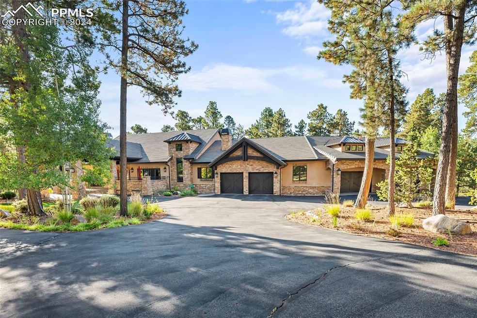 View of front of home with amazing garage