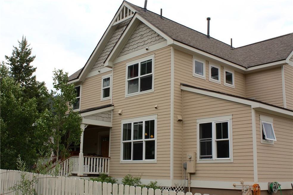 Exterior of the home featuring large fenced yard,