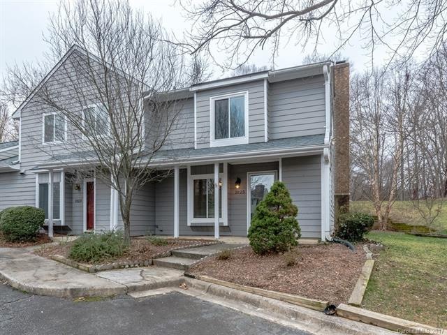 Spacious, private end unit town home with covered 