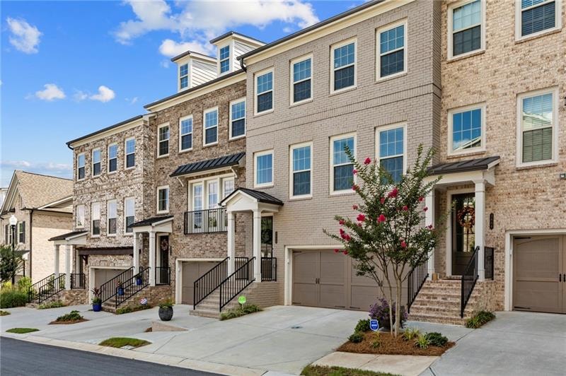 Brick front with w 2-car garage.Ample guest parkin