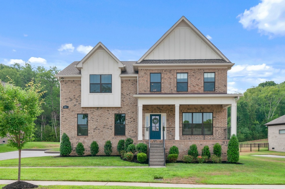 Welcome. Better than new! Side entry garage. Large rocking chair front porch, covered, screened-in back porch.  No homes right behind or in front of this home. One of the best lots in the neighborhood.