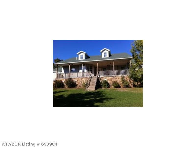 Exterior Front. Porch overlooks a fenced in front yard for kids to play with a view of the mountain - on 2.99 acres