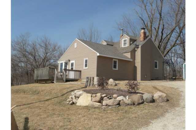 Exterior Front. New Roof and Siding in 2015