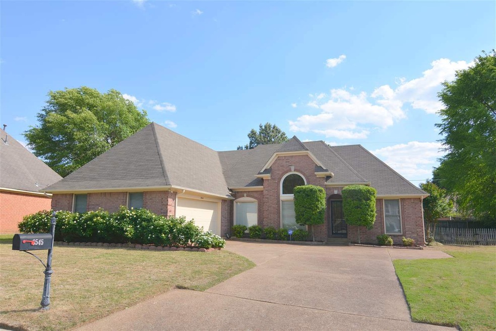 Gorgeous brick home w/covered entry. Impeccably ca