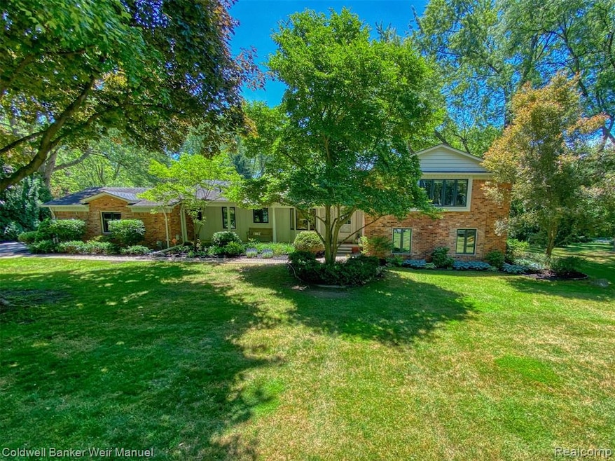 Sprawling Brick Quad Level