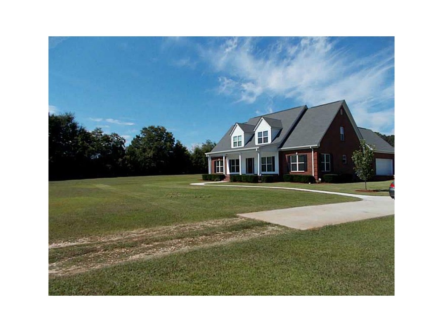 Exterior Front. Beautiful all brick home on  4.81 