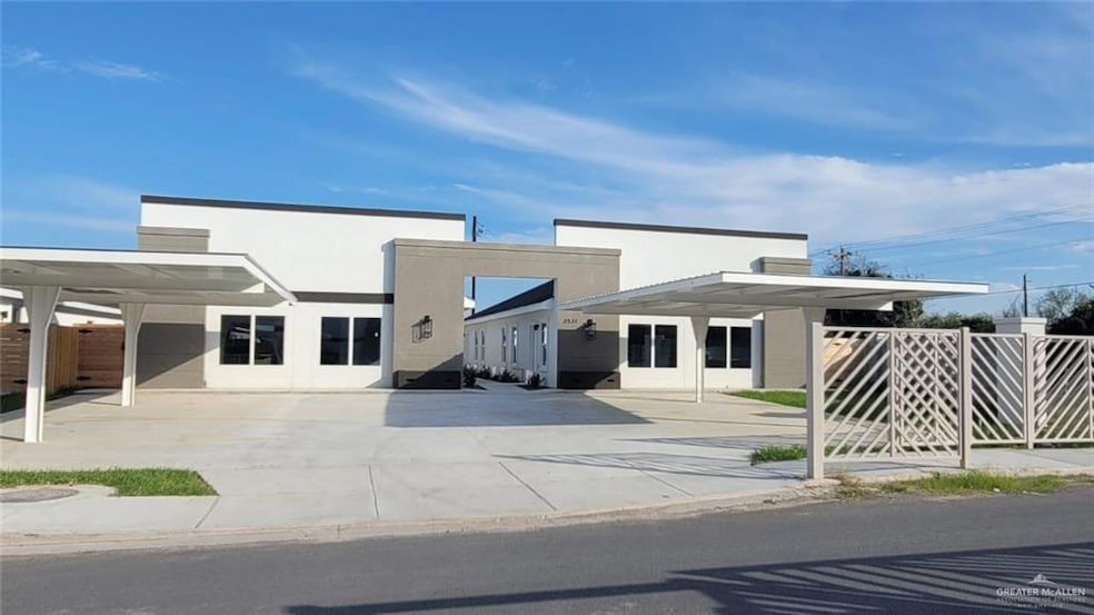 View of front facade with a carport