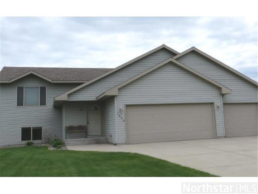 Front view.  Nice three stall garage.