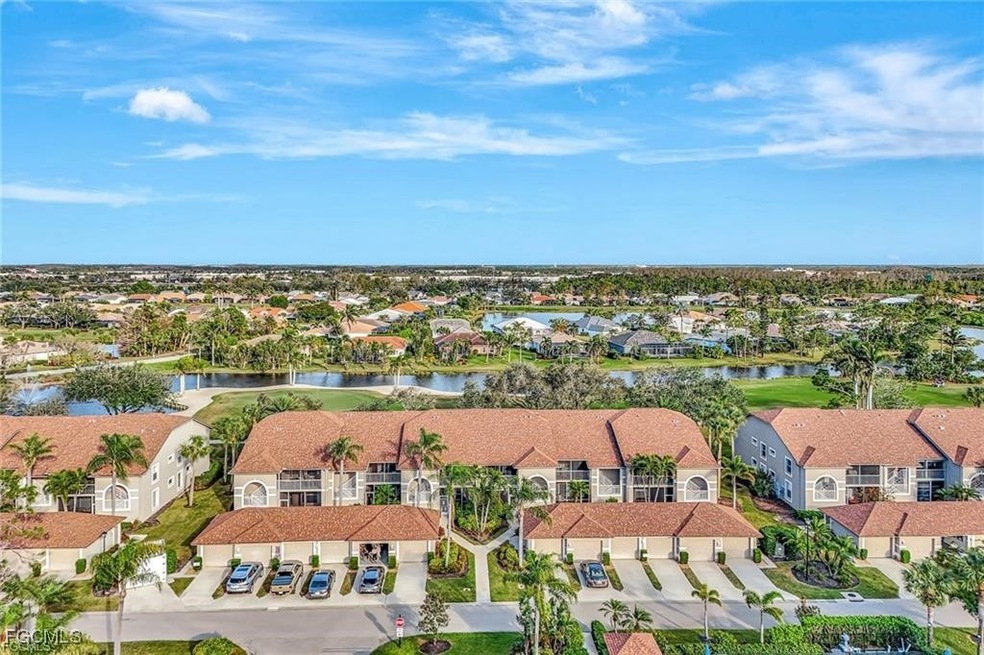 Aerial view of residential area with a large body of water