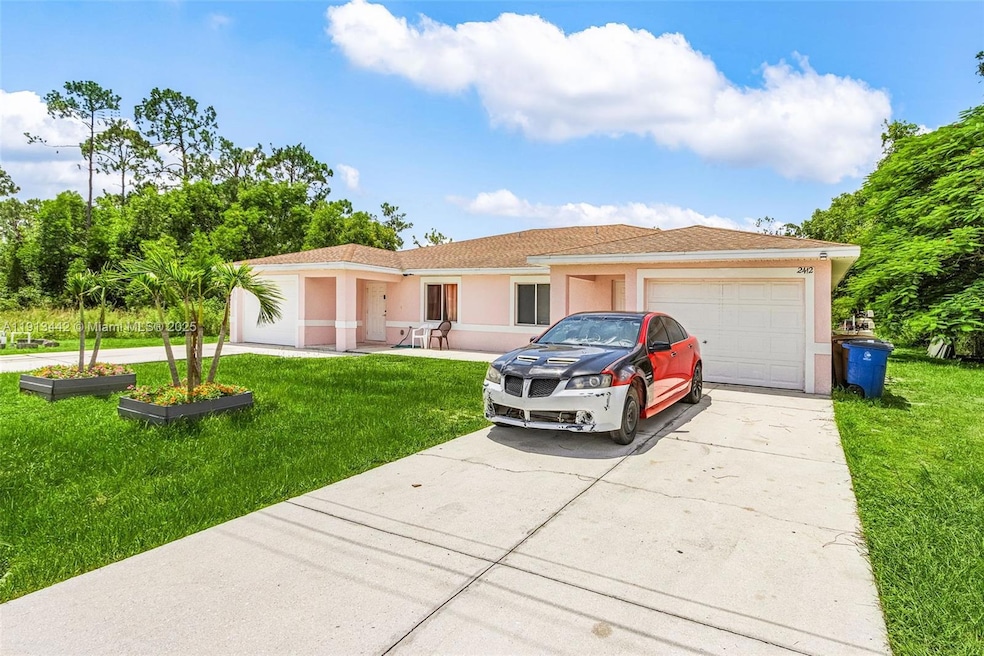 2412 Millie Ave S, Lehigh Acres, FL 33973 - photo 1