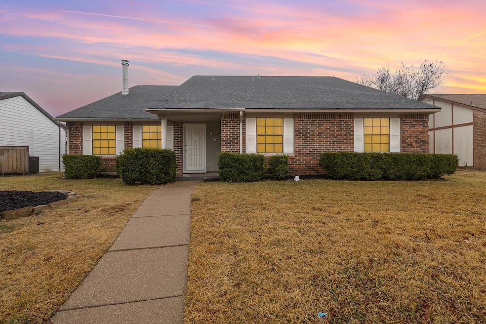 Single story home with a yard