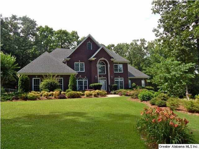 A gorgeous custom built 5BR home loaded with featu