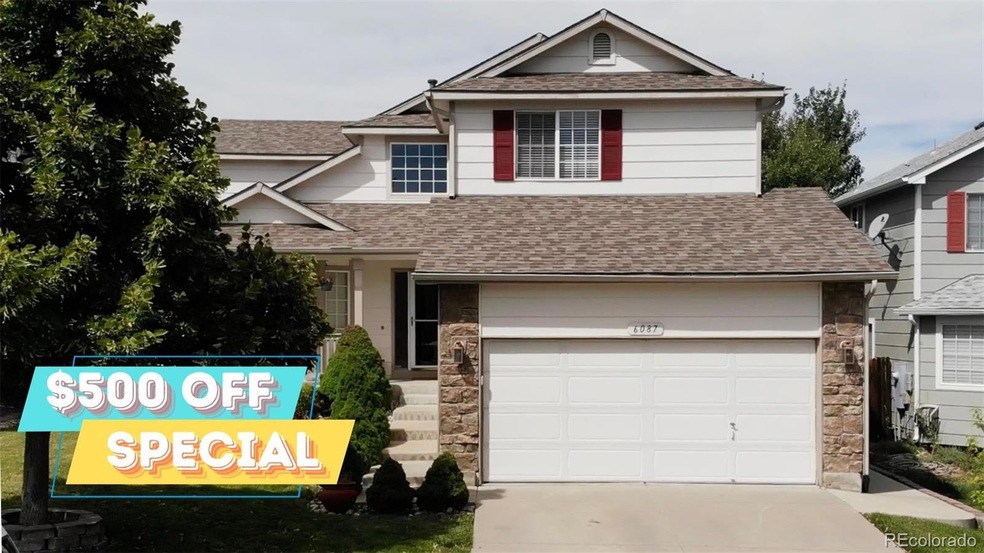 6087 S Quatar Way, Aurora, CO 80015 - photo 1