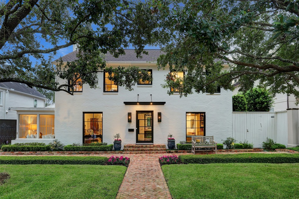 Gorgeous painted brick façade with stylish illuminated canopy, great windows and steel door set the stage for this sophisticated treasure!