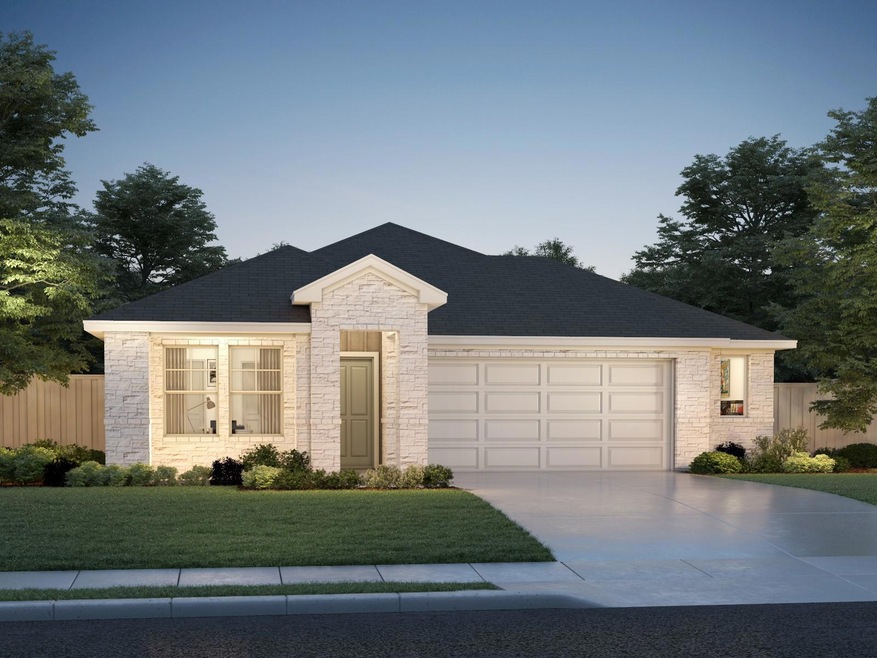 View of front of home with stone siding, concrete