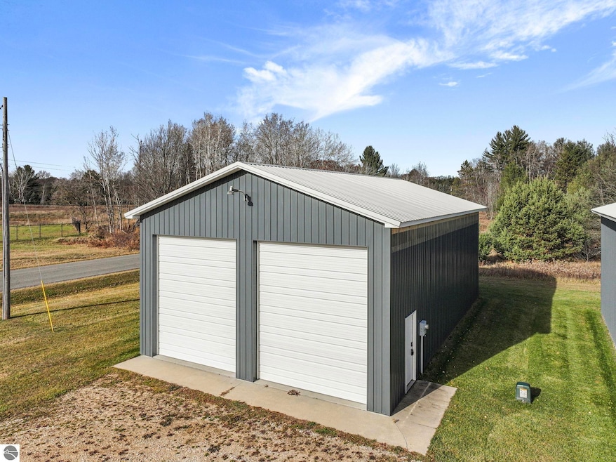 668 N Al Moses Rd, Caldwell Township, MI 49651 - photo 1