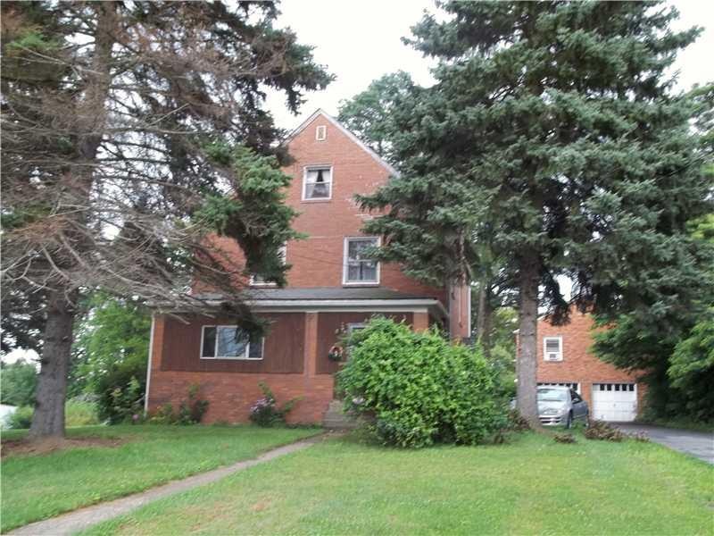 Exterior Front. THREE STORY FOUR BEDROOM BRICK COL