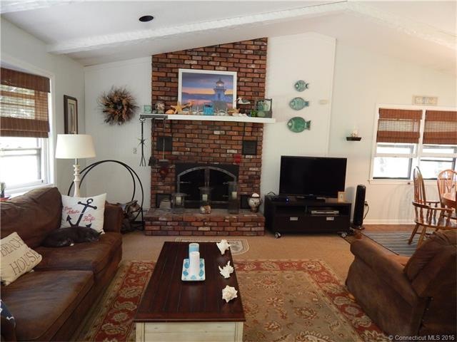 Bright and Beautiful Living Room with Vaulted Ceil