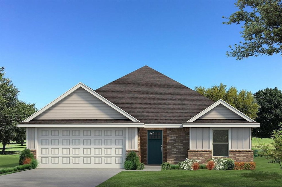 View of front facade with roof with shingles, board and batten siding, an attached garage, concrete driveway, and brick siding