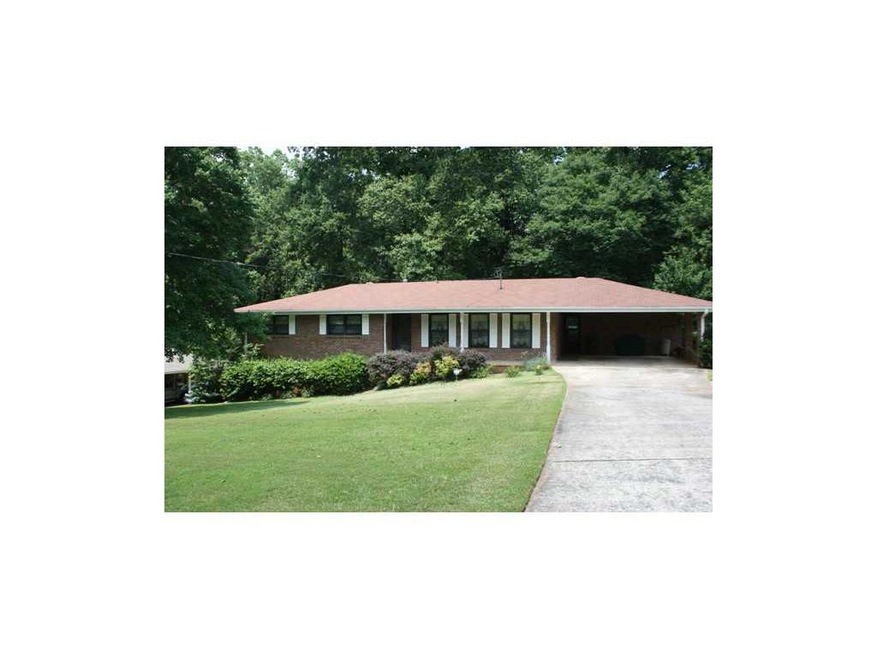 Exterior Front. Brick ranch with finished baxement
