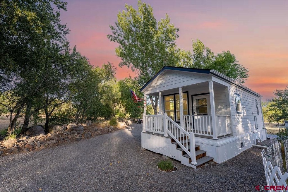 205 N Grand Mesa Dr unit 7, Cedaredge, CO 81413 - photo 1