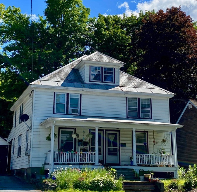 side by side townhouses with basements and attics 