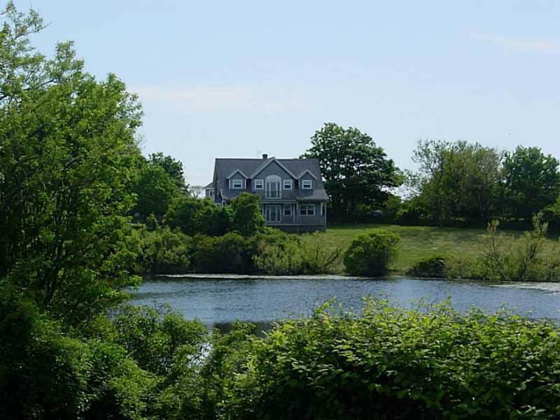 Exterior Front. Exterior with Continental Pond