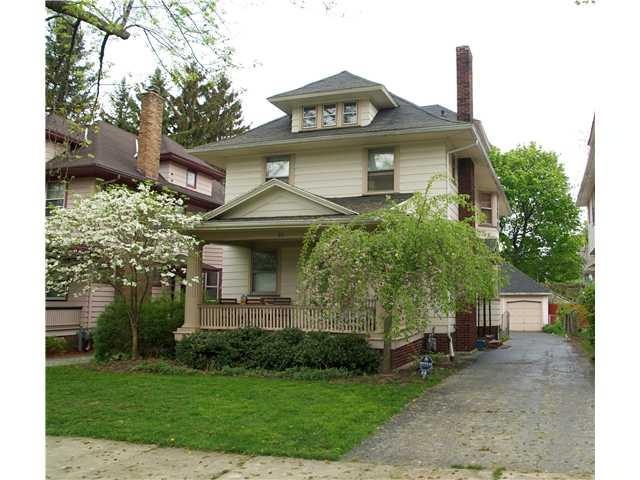 Exterior Front Gracious Colonial with lovely flowe