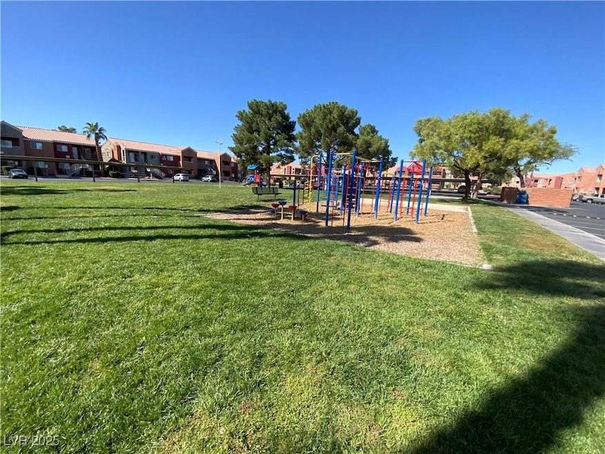 Communal playground featuring a yard