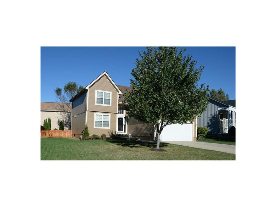 Great front lawn and tree. Newer roof, gutters and