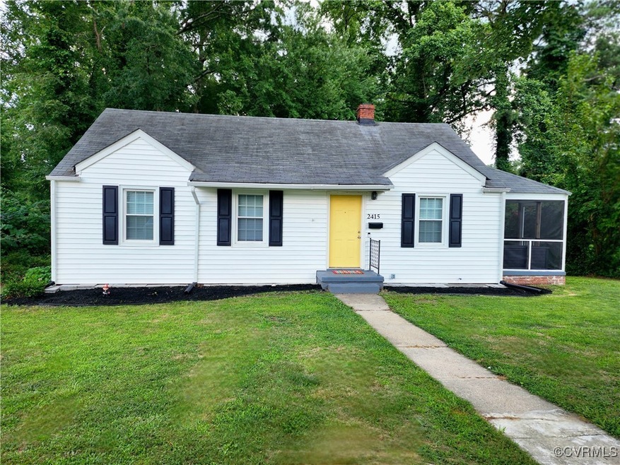 View of front of property with a front lawn