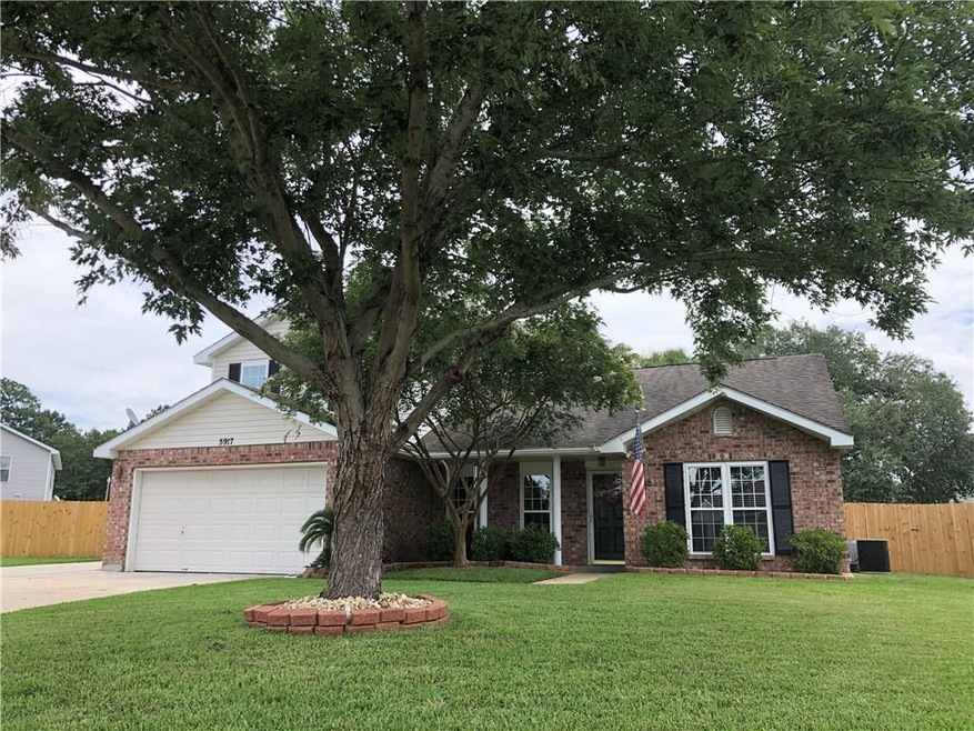 This home has lovely curb appeal and is situated o