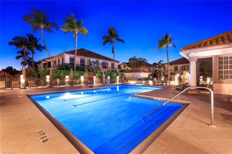 Community pool with a patio area