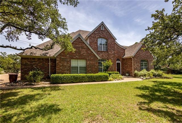 Stately all brick home in Heritage Oaks, just under 2 quiet and shady acres but directly across from Belterra Villages shopping center and about 6 miles to either the Y in Oak Hill or RR 12 and 290!
