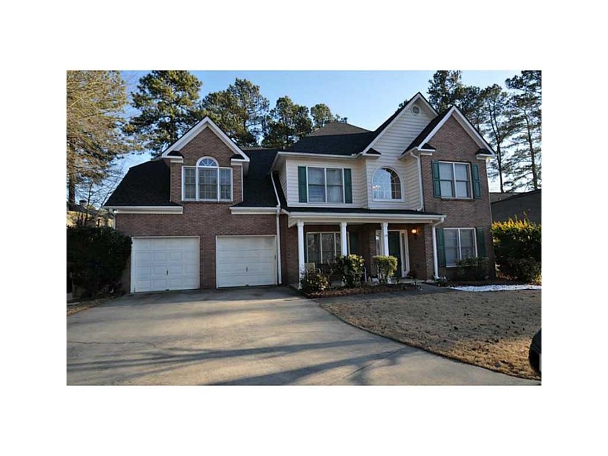 Exterior Front. Sought after Suwanee 5/2.5 Home.